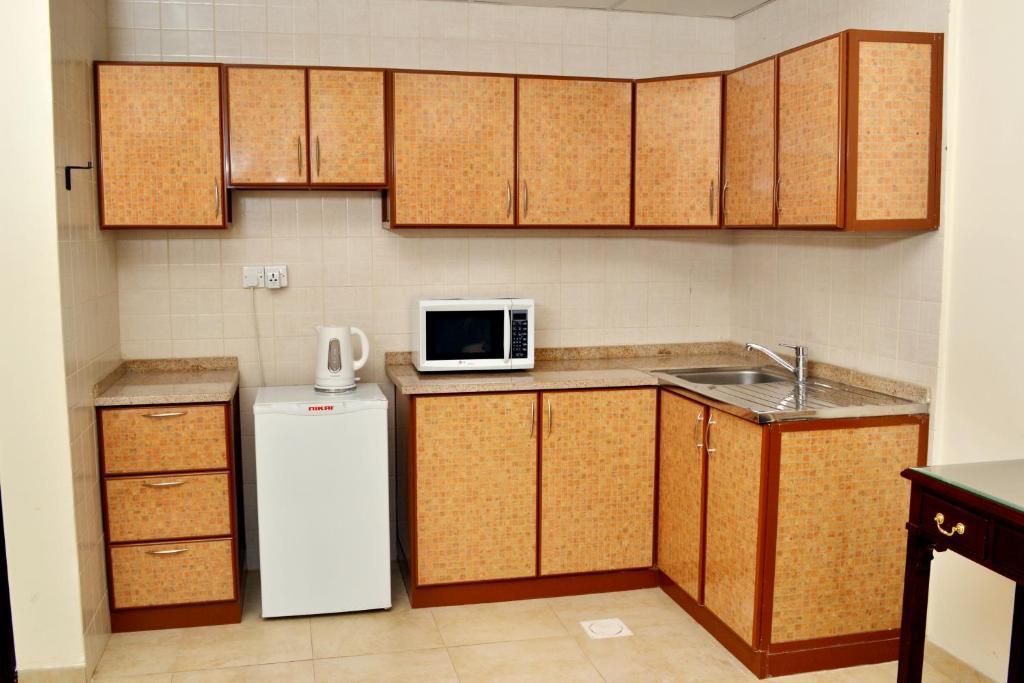 Sara Hotel Apartments Adzsmán Szoba fotó